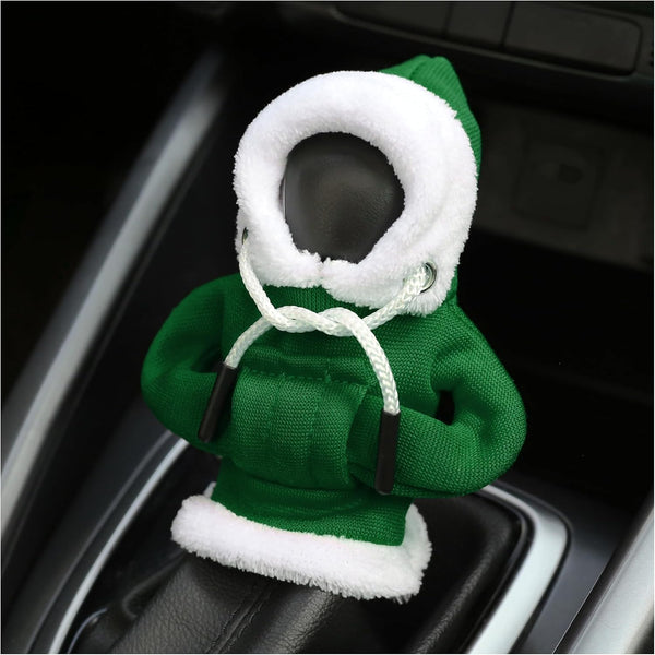 Hoodie Vert Doublure Polaire pour levier de vitesse, installé dans une voiture, avec capuche bordée de fausse fourrure blanche.