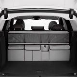 Organisateur de banquette voiture gris installé à l'arrière de la banquette, côté coffre