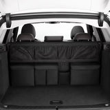 Organisateur de banquette voiture noir installé à l'arrière de la banquette d'un SUV